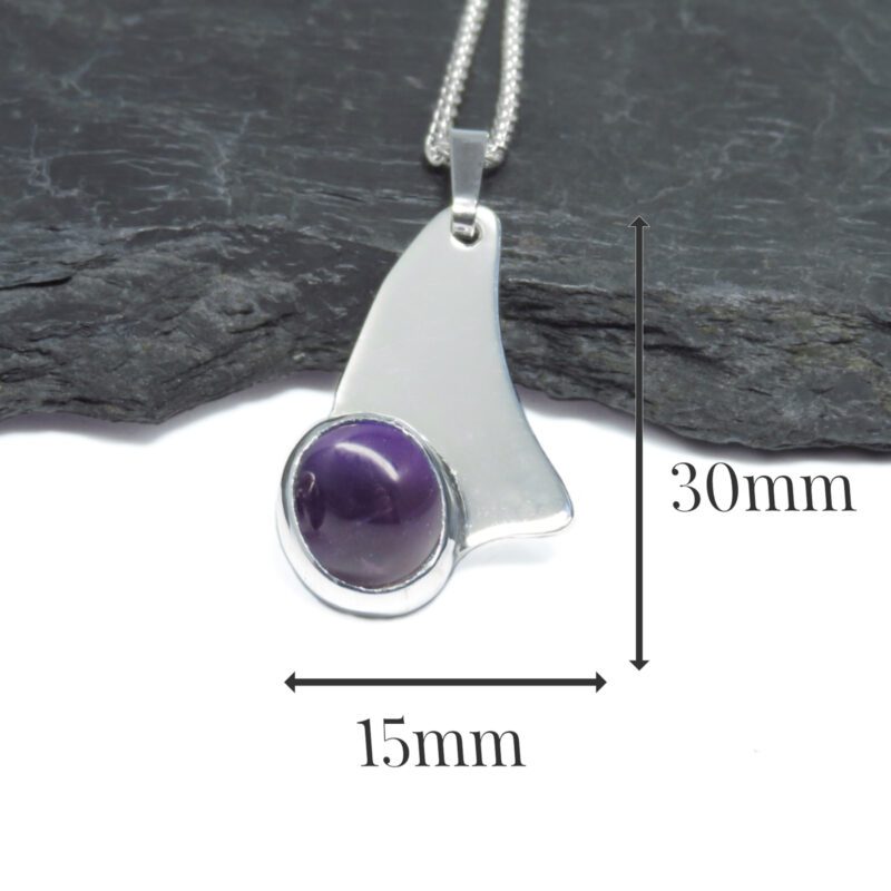 C256 - Sterling silver and Amethyst pendant. Measures 30x15mm
