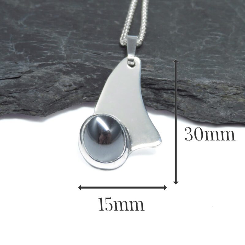 C256 - Sterling silver and Hematite pendant. Measures 30x15mm