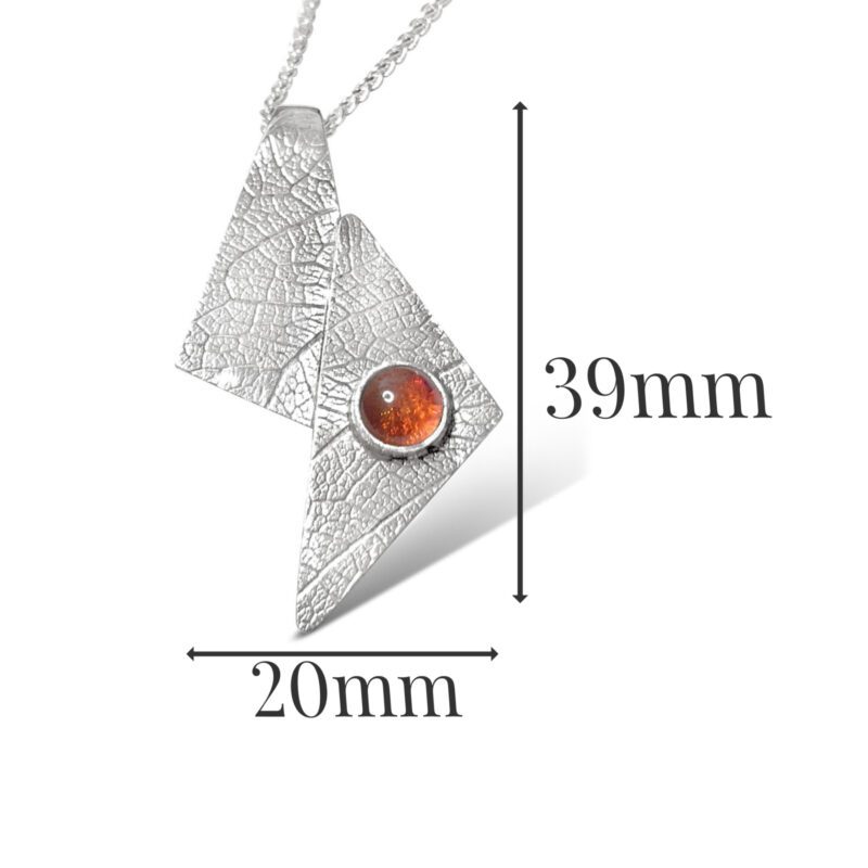 L541-sterling silver and Amber pendant. Measures 39 x 20mm
