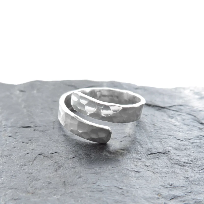 Sterling silver ring with dimple texture. Available in 3 sizes.