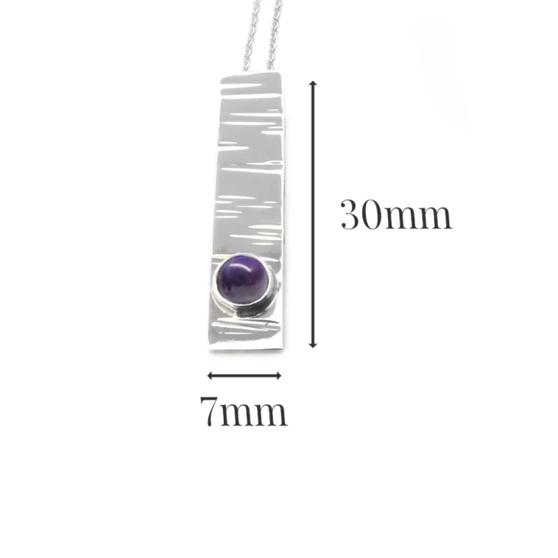 Sterling silver and 5mm Amethyst pendant featuring the bark texture. This pendant comes complete with a 16-18″ sterling silver chain.