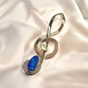9ct gold treble clef and Opal pendant