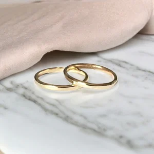 matching 9ct gold rings with 'Dad' engraved on the inside.