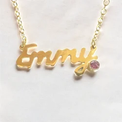Sterling silver name necklace set with Pink Tourmaline which has been gold plated and has ashes hidden in resin behind the stone.